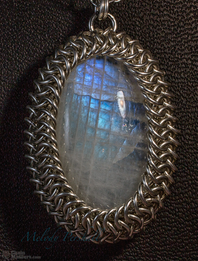 Rainbow moonstone wrapped cab